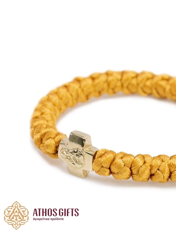Handmade braided bracelet with cross