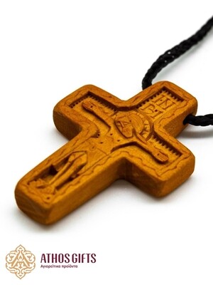 Carved cross with the Crucifixion of Jesus Christ depicted on the front side