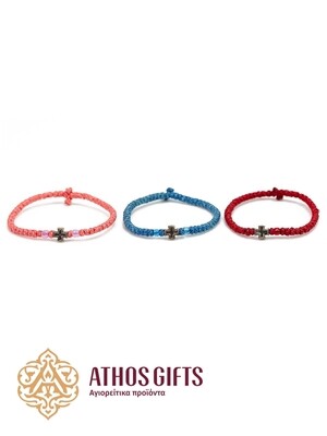 Handmade bracelets with a silver cross.