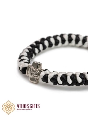 Handmade two-tone bracelet with a cross.