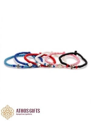 Handmade bracelets with a silver cross.