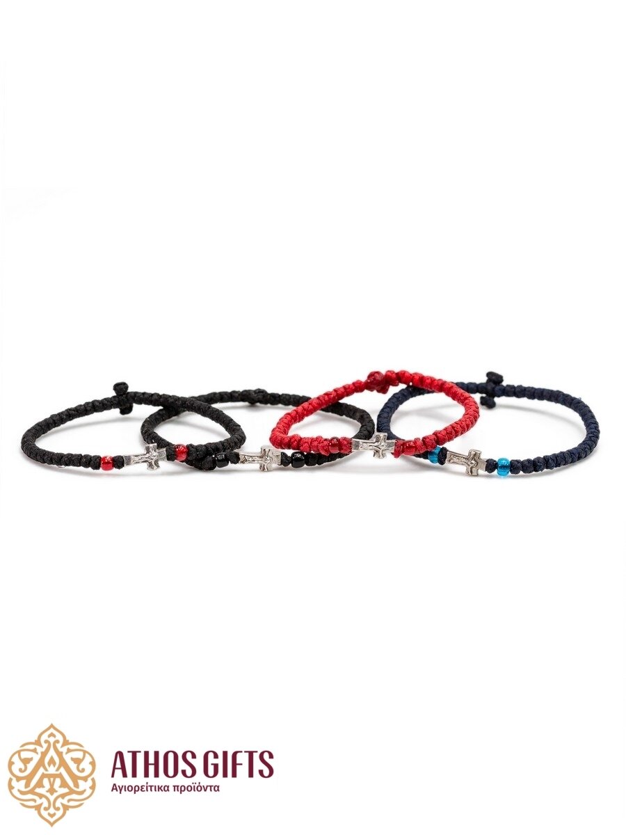 Handmade bracelets with a silver cross.