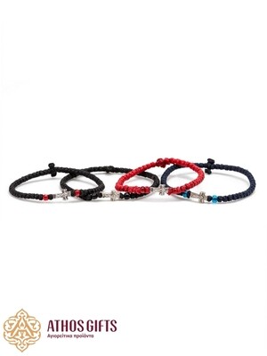 Handmade bracelets with a silver cross.