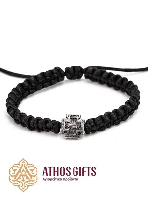 Handmade black woven bracelet with a metal cross