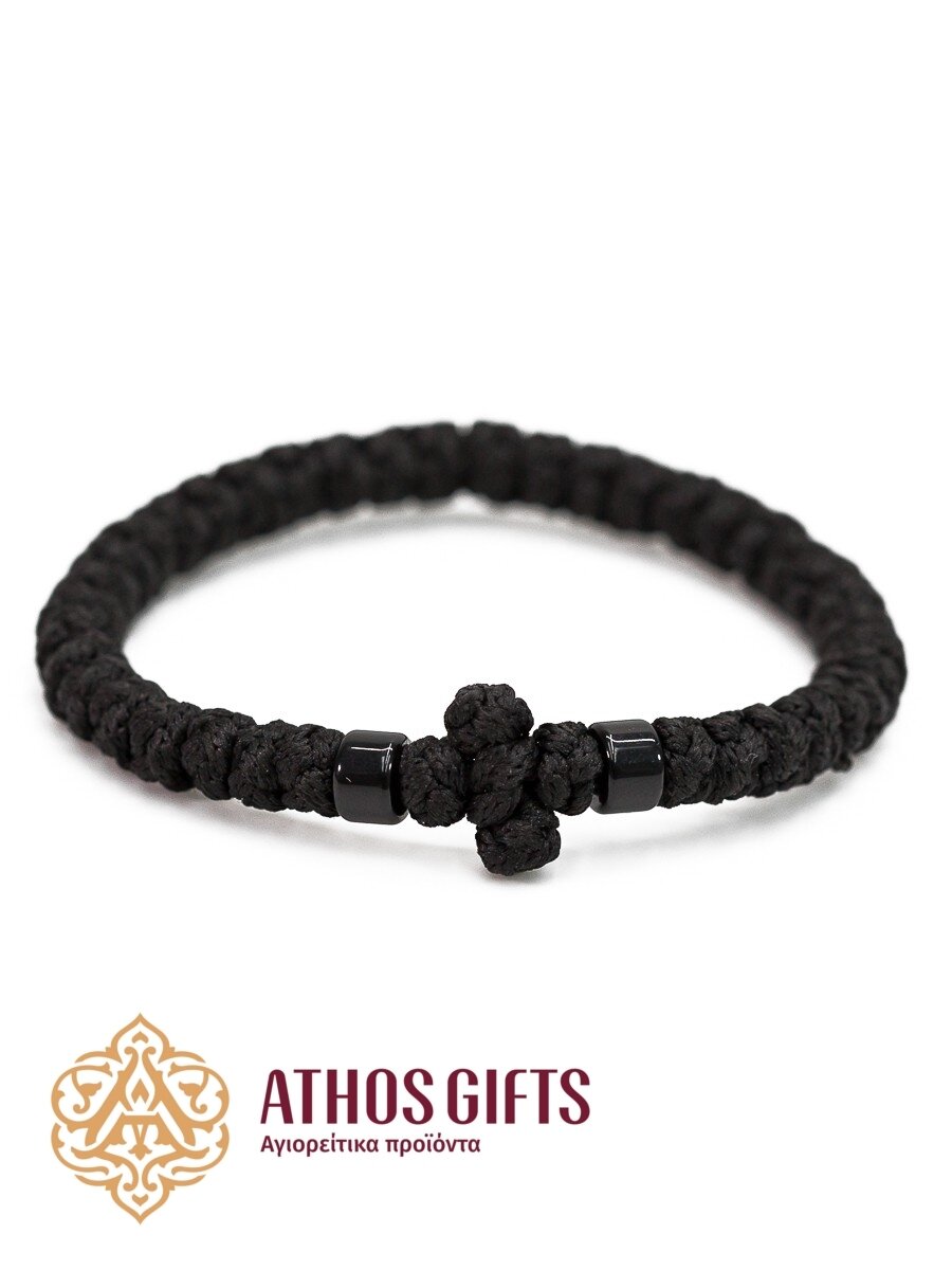 Orthodox woven bracelet with a cross and black beads.