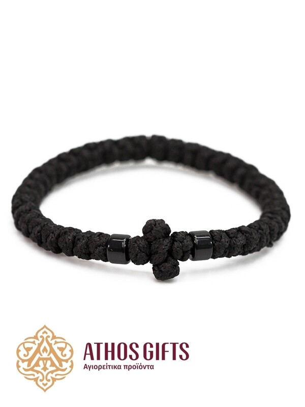 Orthodox woven bracelet with a cross and black beads.