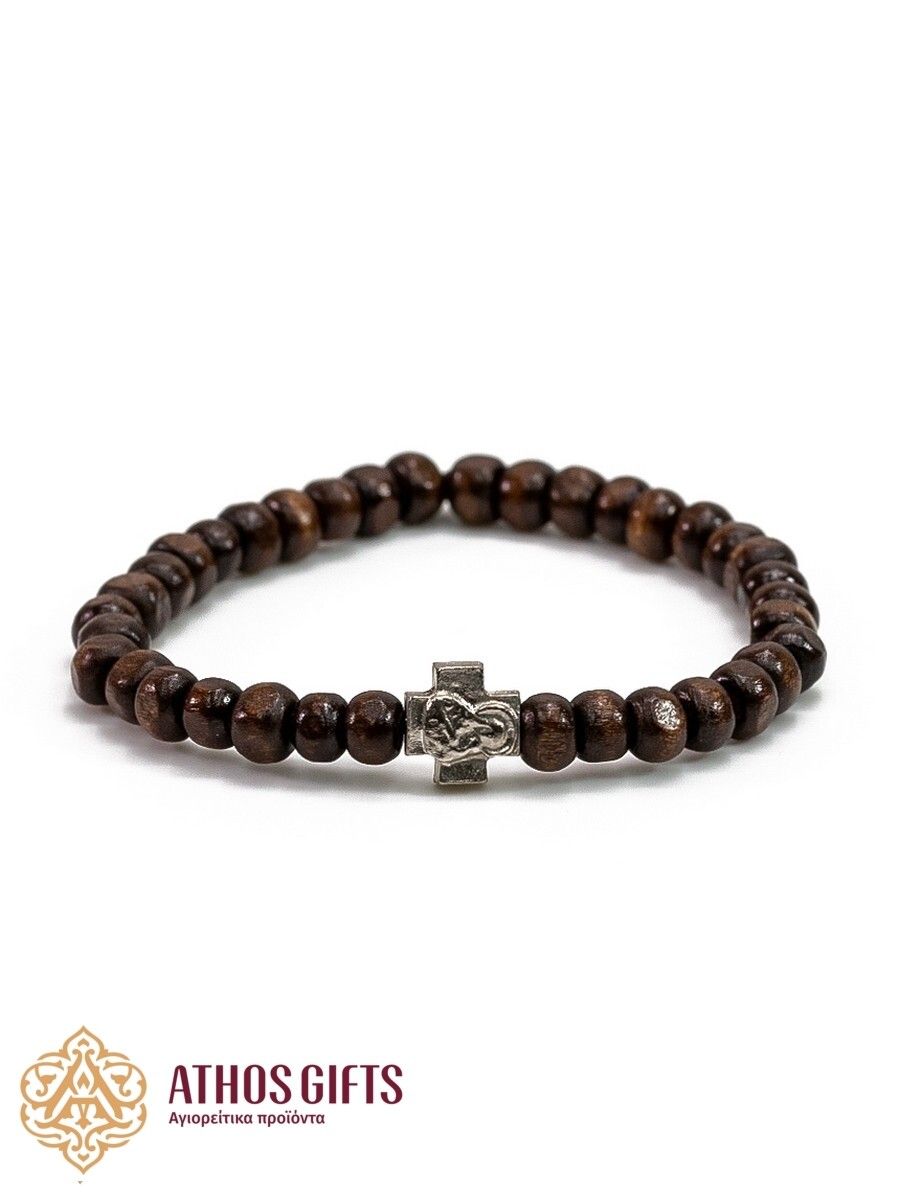Dark wooden bracelet with a cross, made by Athonite monks.
