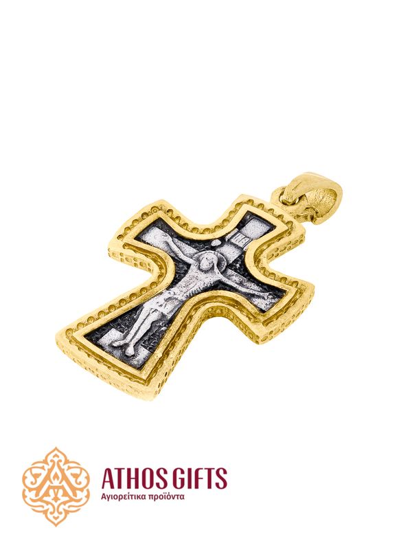 A silver cross pendant for the neck with an icon.