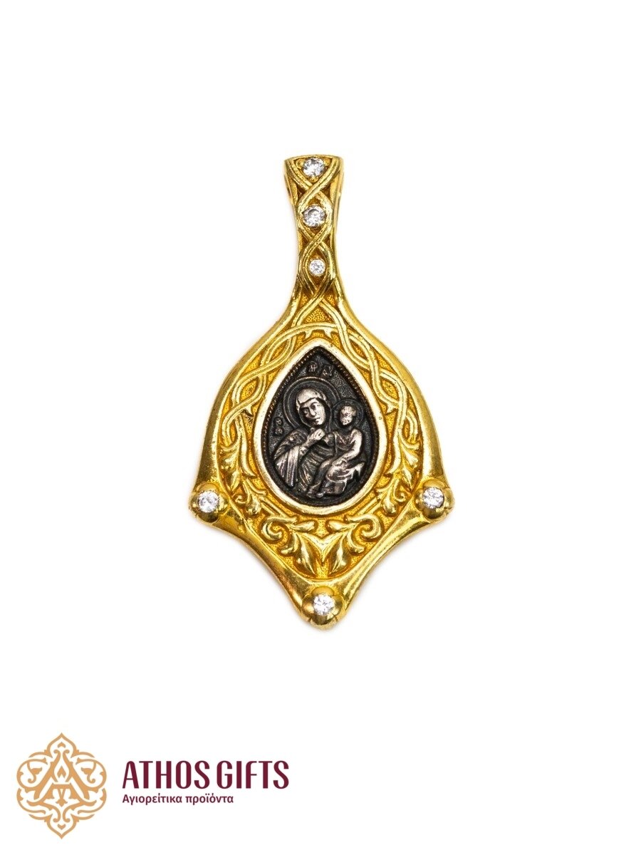 Silver icon medallion depicting the icon “Mother of God Joy and Consolation.”