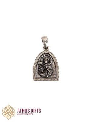 Silver icon medallion with the image of Saint Anna