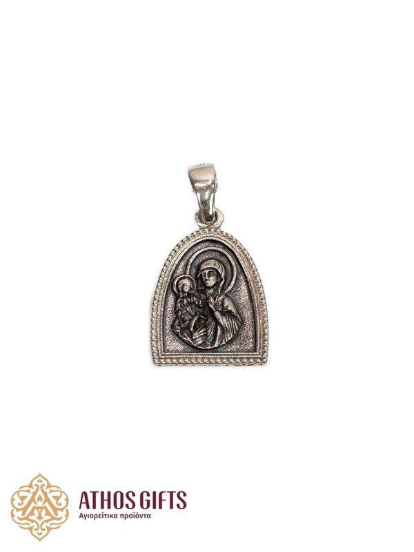 Silver icon medallion with the image of Saint Anna