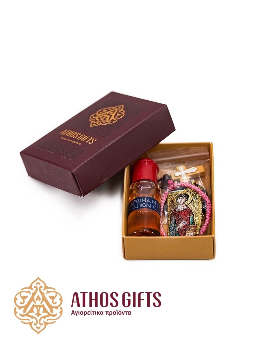 The gift set consists of 4 items: a baptismal cross, myrrh, a komboskini bracelet, and a fabric incense pouch.