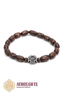 Dark wooden bracelet with a cross, made by Athonite monks.
