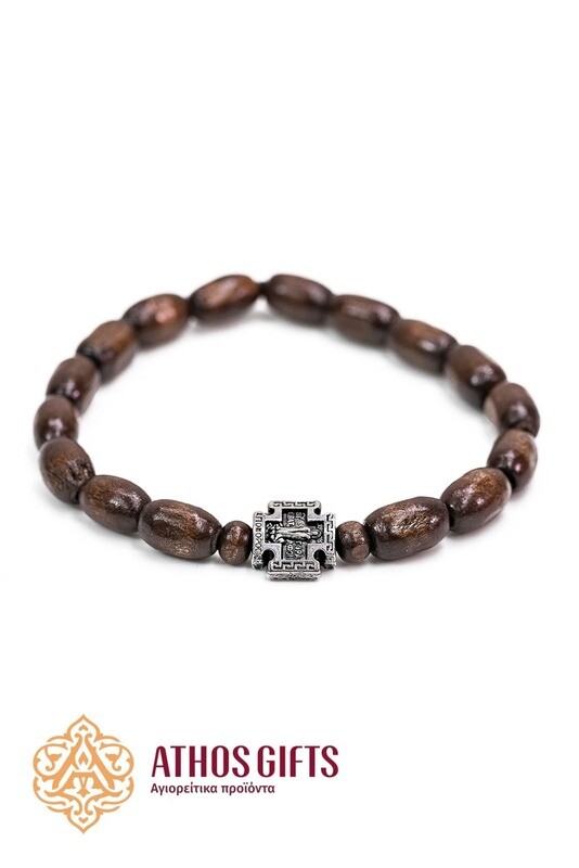 Dark wooden bracelet with a cross, made by Athonite monks.