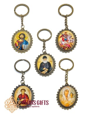 Bronze metal keychains with icons of Jesus Christ, the Mother of God, and saints.