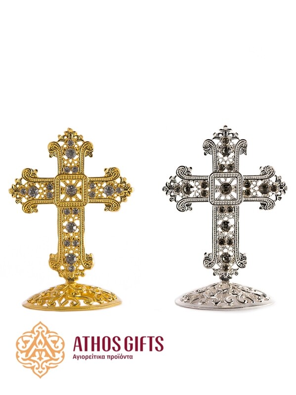An 8 cm metal tabletop cross for the Christian faith.