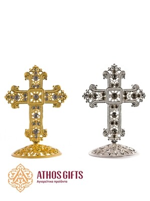 An 8 cm metal tabletop cross for the Christian faith.