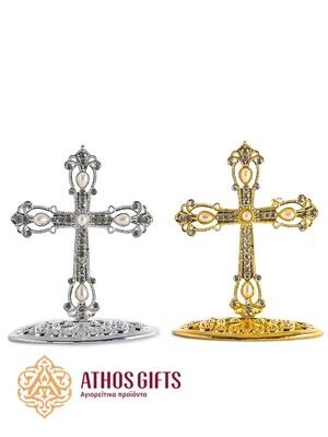 An 8 cm metal tabletop cross for the Christian faith.