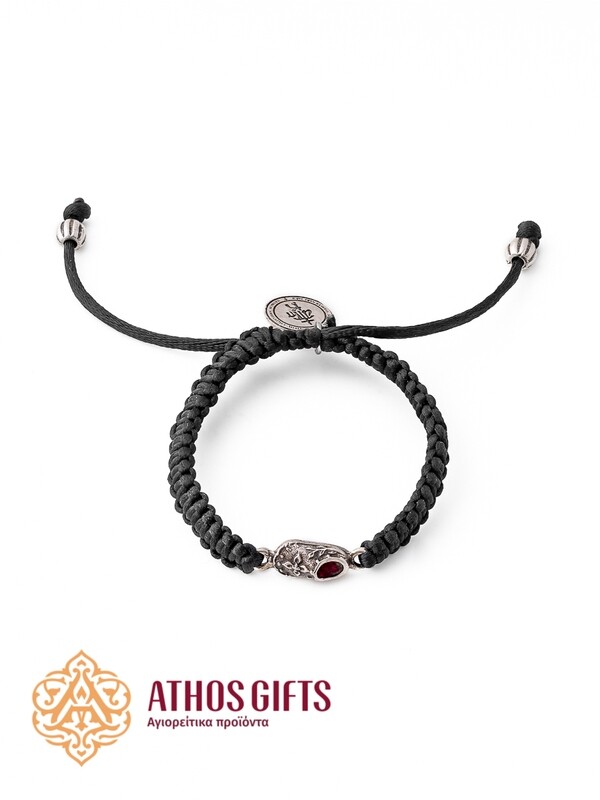 St. Spyridon bracelet with a metal slipper containing a fragment of the saint’s slippers.