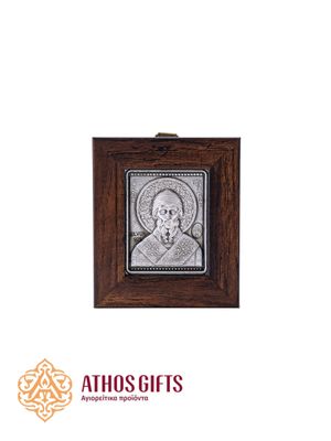 An exact replica of a Byzantine icon of St. Spyridon in 925 sterling silver in a wooden frame.