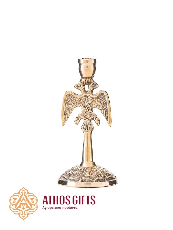 Metal candle holder for one candle with a relief image of the double-headed eagle — the emblem of the Byzantine Empire