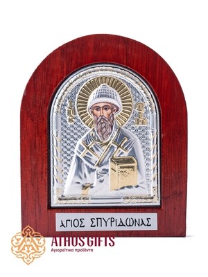 Saint Spyridon metal icon in a wooden frame.