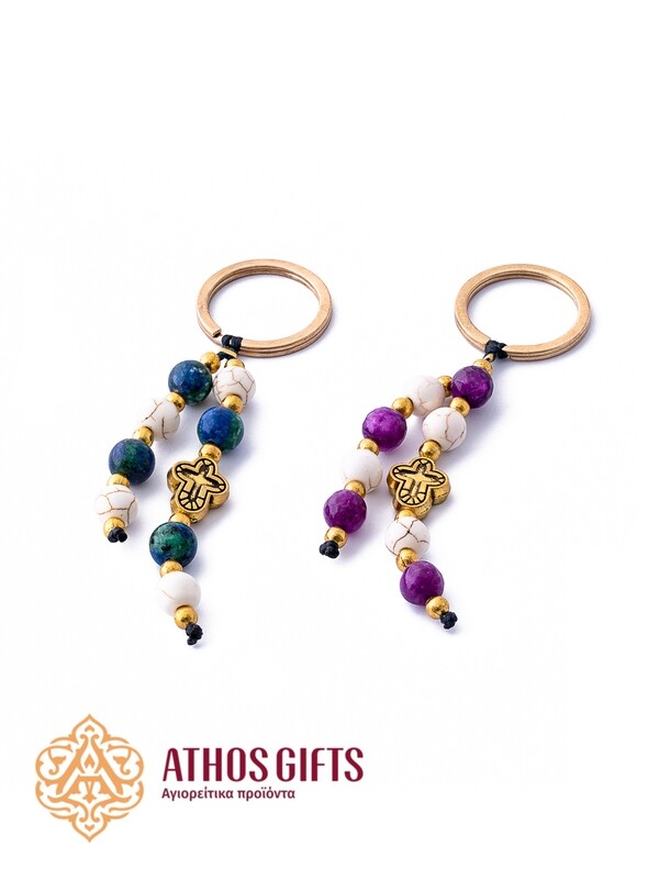 Keychain with a cross and beads.