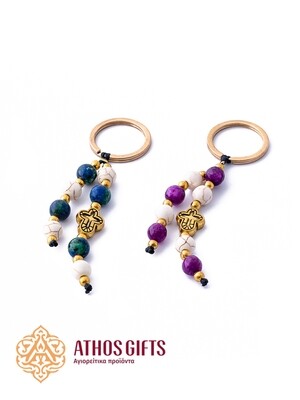 Keychain with a cross and beads.