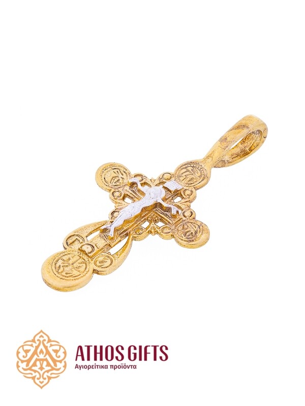A cross pendant for the neck made of silver with gilding.