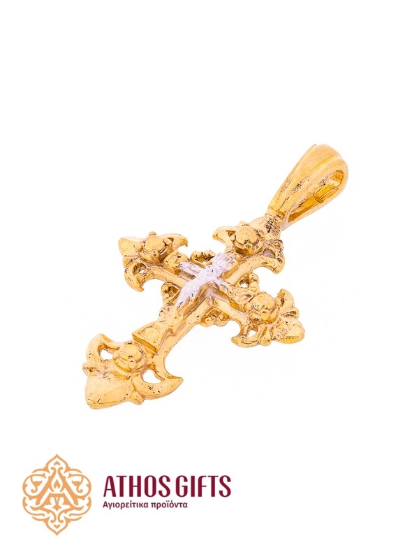 A cross pendant for the neck made of silver with gilding.
