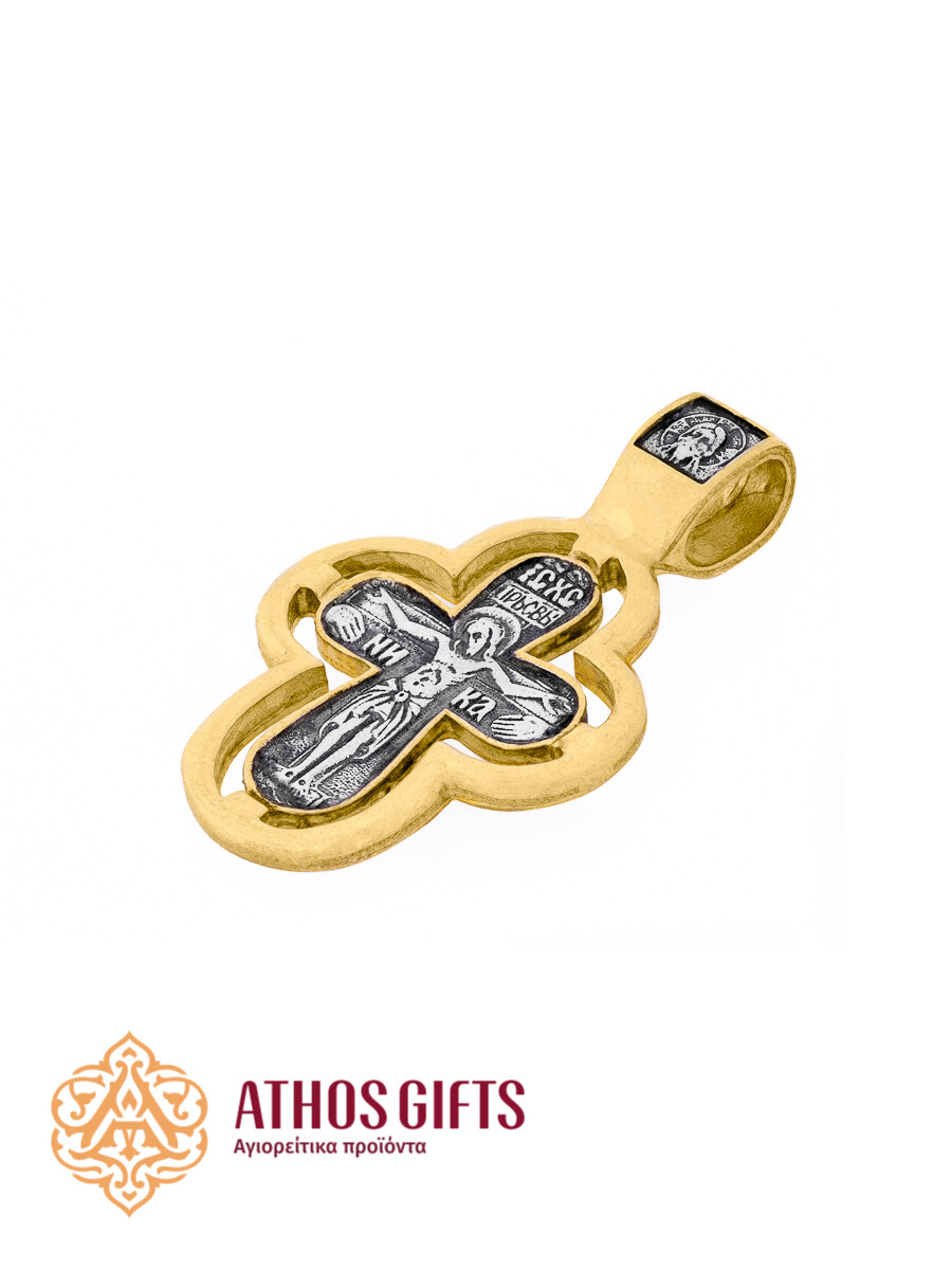 A cross pendant for the neck made of silver with gilding.