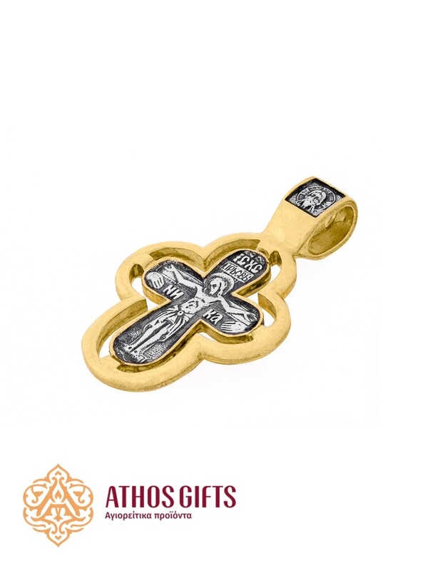 A cross pendant for the neck made of silver with gilding.