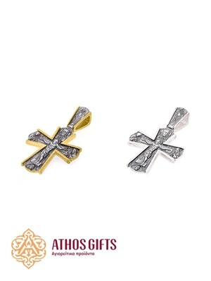 A cross pendant for the neck made of silver / partially gold-plated silver.