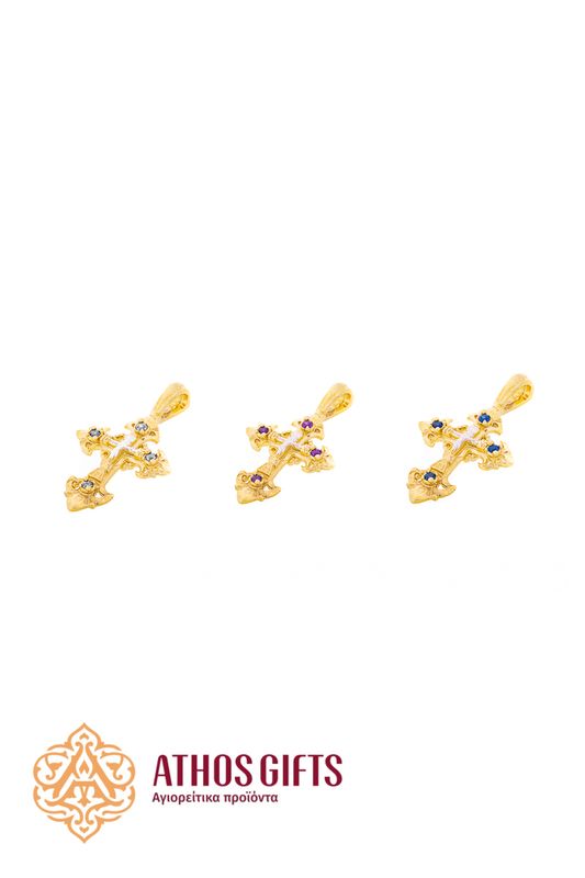 A cross pendant for the neck made of silver with gilding.