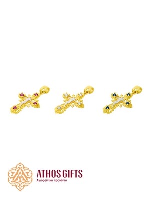 A cross pendant for the neck made of silver with gilding.