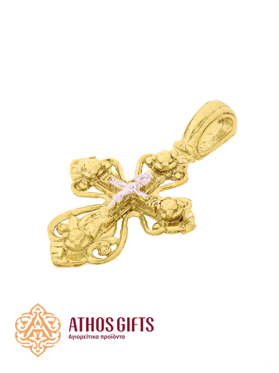 A cross pendant for the neck made of silver with gilding.