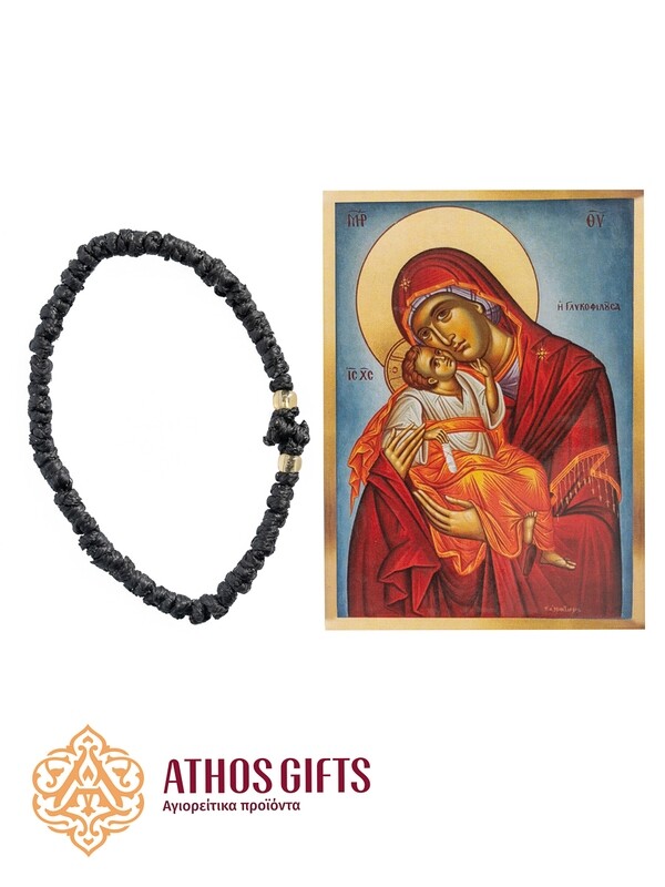 Magnet icon of the Mother of God “Tenderness” and a black komboskini bracelet.
