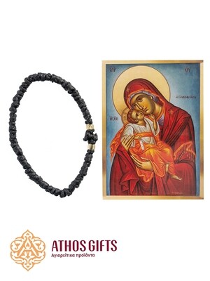 Magnet icon of the Mother of God “Tenderness” and a black komboskini bracelet.