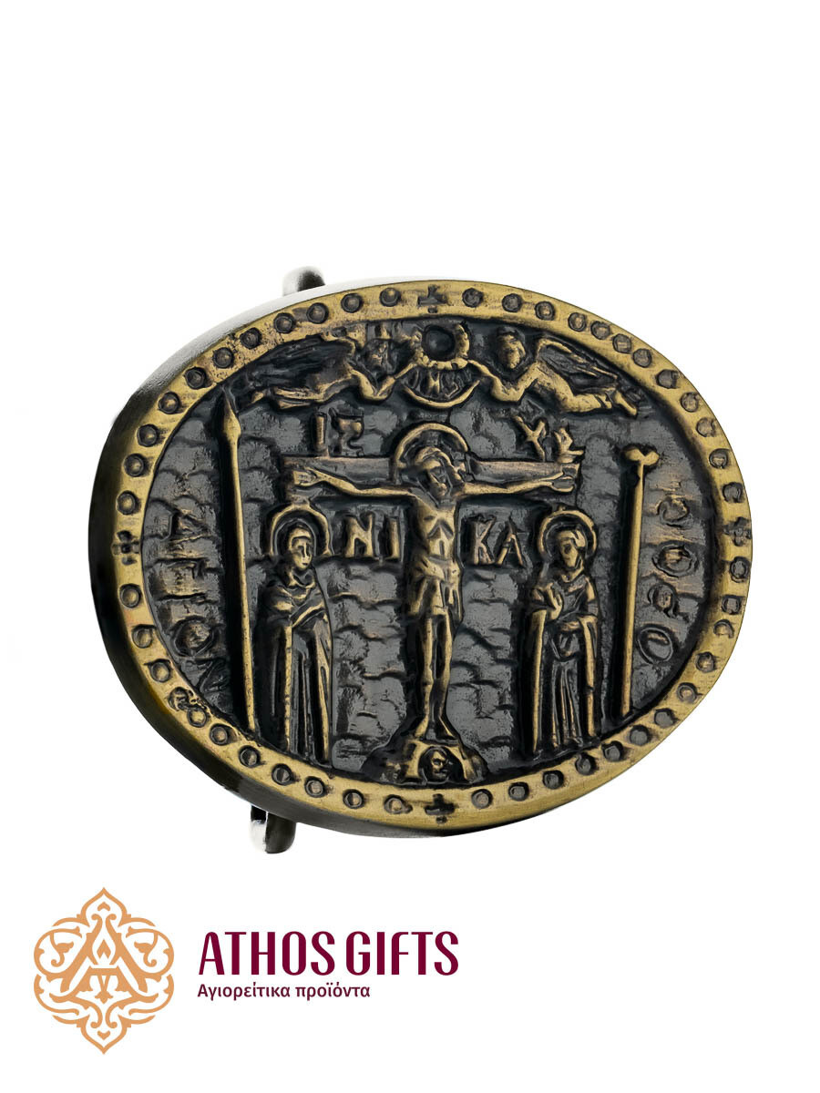 Metal belt buckle with an image of the Crucifixion of Jesus Christ and the inscription "Άγιον Όρος".
