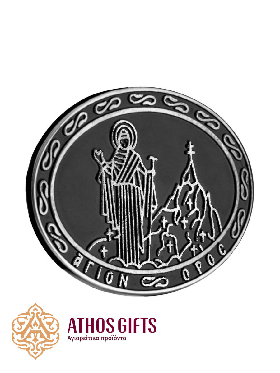 Metal belt buckle with an image of the Virgin Mary Athonitissa.