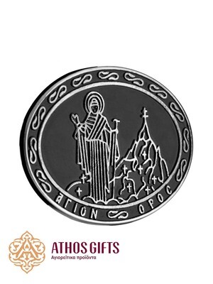 Metal belt buckle with an image of the Virgin Mary Athonitissa.