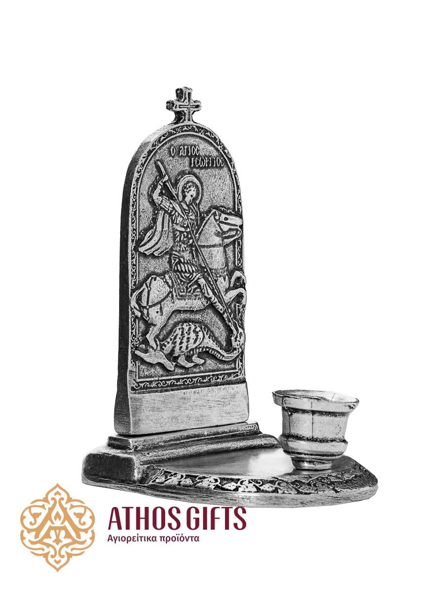Silver-colored metal candle holder with the image of Saint George the Victorious