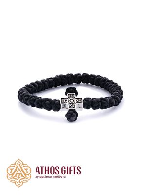 Braided prayer rope bracelet (komboskini) with a metal cross featuring the Christogram ΙΣ ΧΣ ΝΙ ΚΑ.