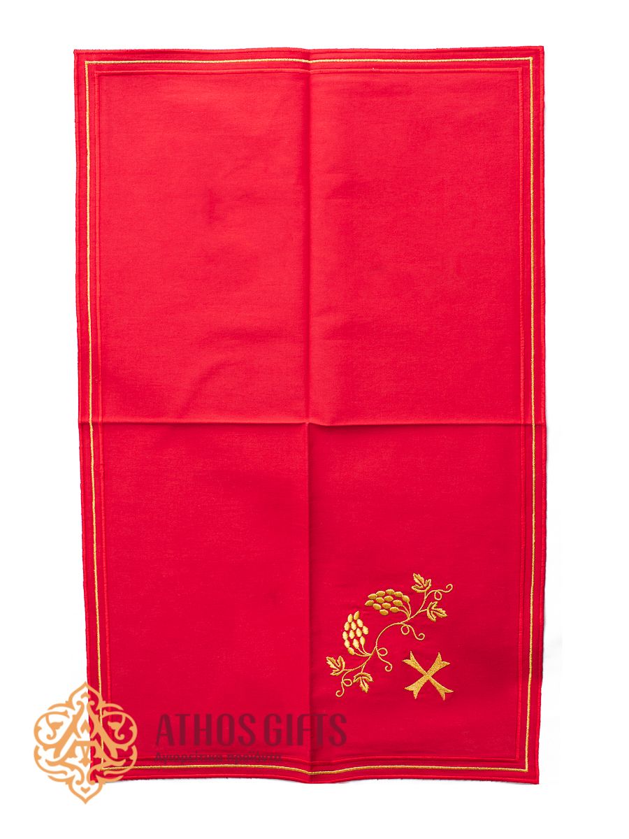 Cloth made of red cotton fabric with gold embroidery