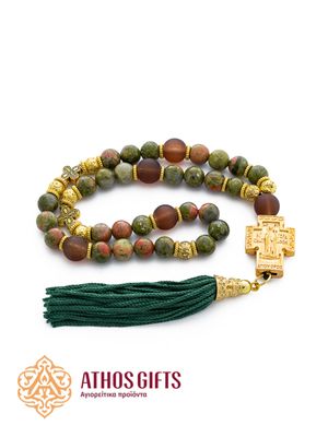 Prayer rope made of unakite with a cross and a tassel, decorated with decorative elements.
