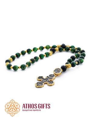Prayer beads made of green tiger’s eye with a cross, decorated with decorative elements.