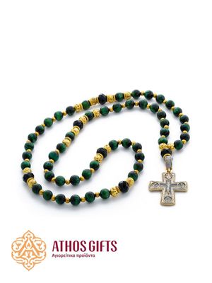 Prayer beads made of green tiger’s eye with a cross, decorated with decorative elements.