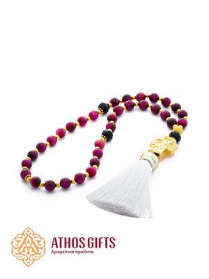 Prayer beads made of raspberry tiger’s eye with a cross, decorated with ornamental elements.