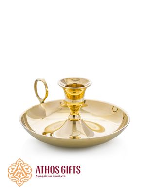 Classic candle holder for one candle on a wide base with a handle.