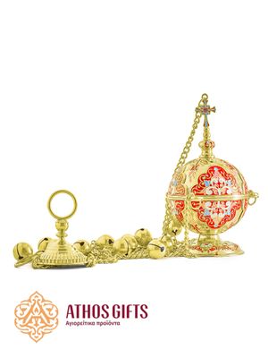 A gold-colored censer for incense.